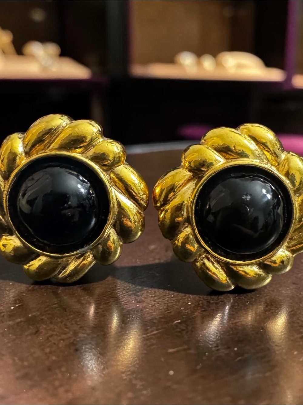 CHANEL Gold-Tone Floral Clip-On Earrings with Black Accents